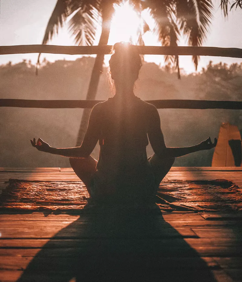 Person sitting calmly during meditation